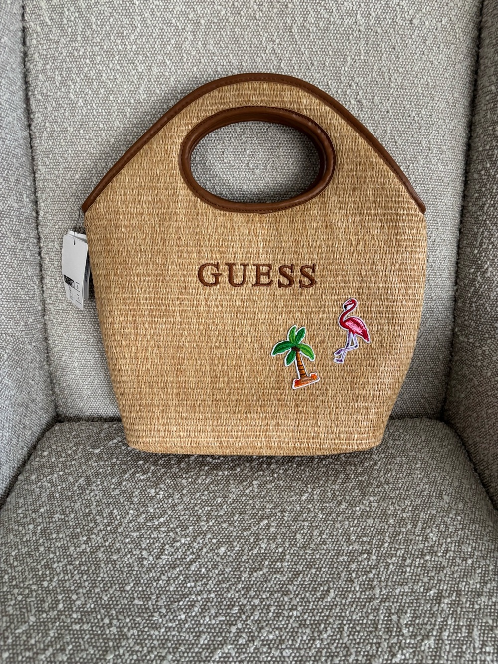GUESS Tan Straw Tote with Pink Flamingo Patch